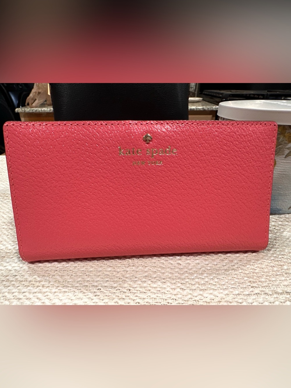 kate spade pink pebbled leather continental wallet with gold logo